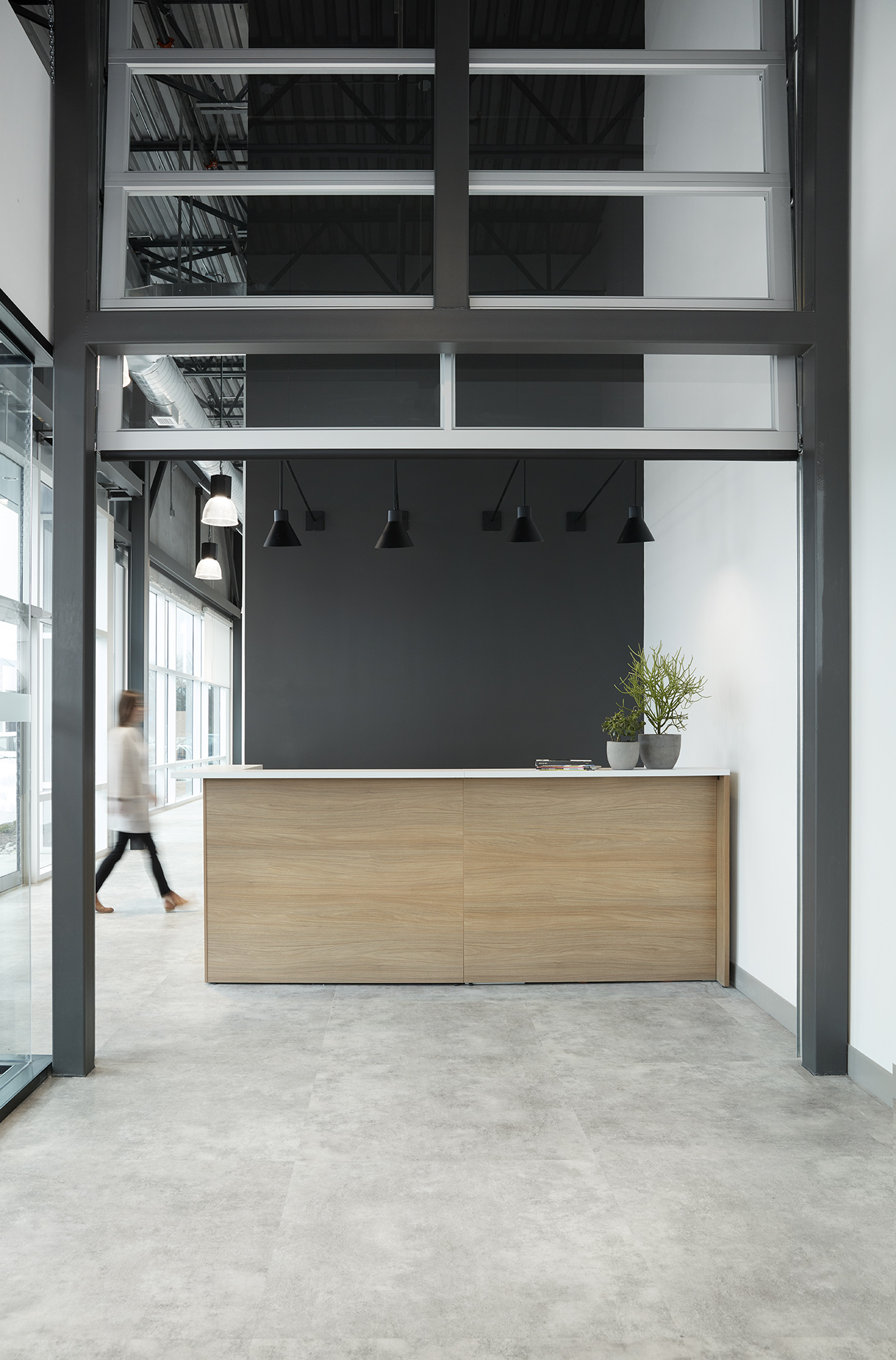 Reception Area with polished concrete floors and garage-style door.