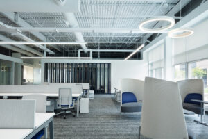 Modern office space with work stations and collaboration area